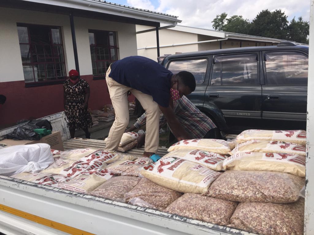 Unloading bags of beans